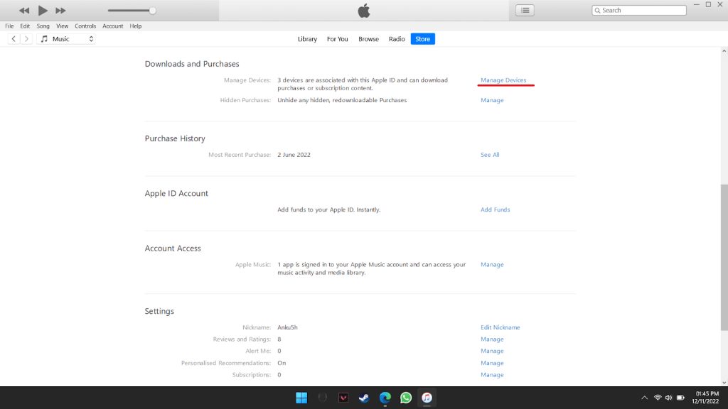 Click on Manage Devices under Downloads and Purchases